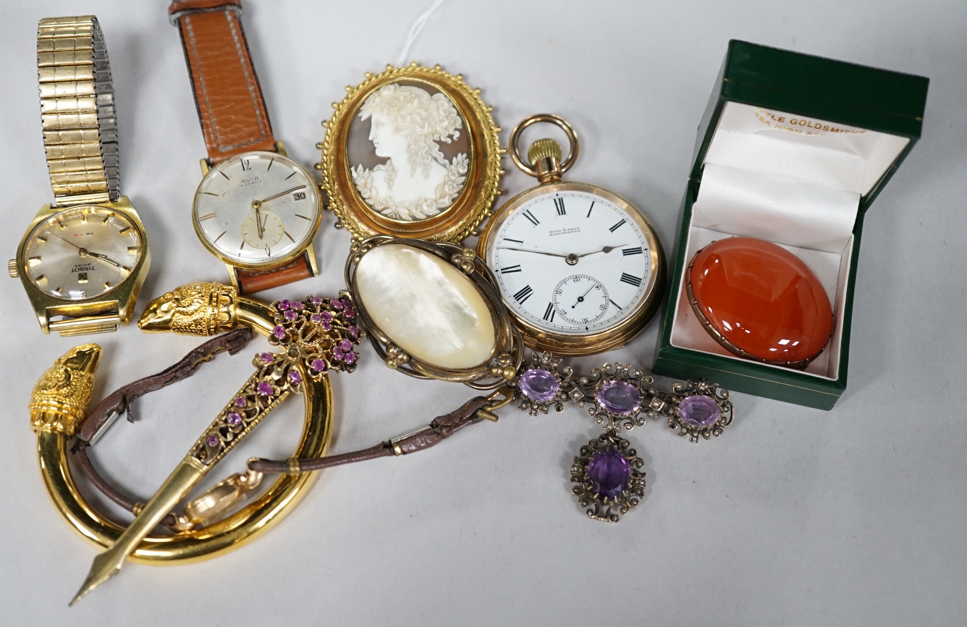 A yellow metal mounted oval cameo shell brooch, carved with the bust of a lady to dexter, with cannetille and rope twist border and other items including costume jewellery, a gold plated pocket watch, two gentleman's wri